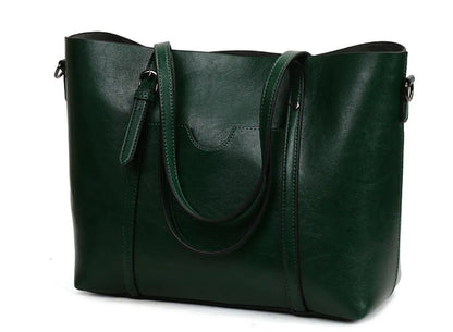 Retro messenger bag showing 31cm length, A4 magazine capacity, available in eight colours including wine red and light blue