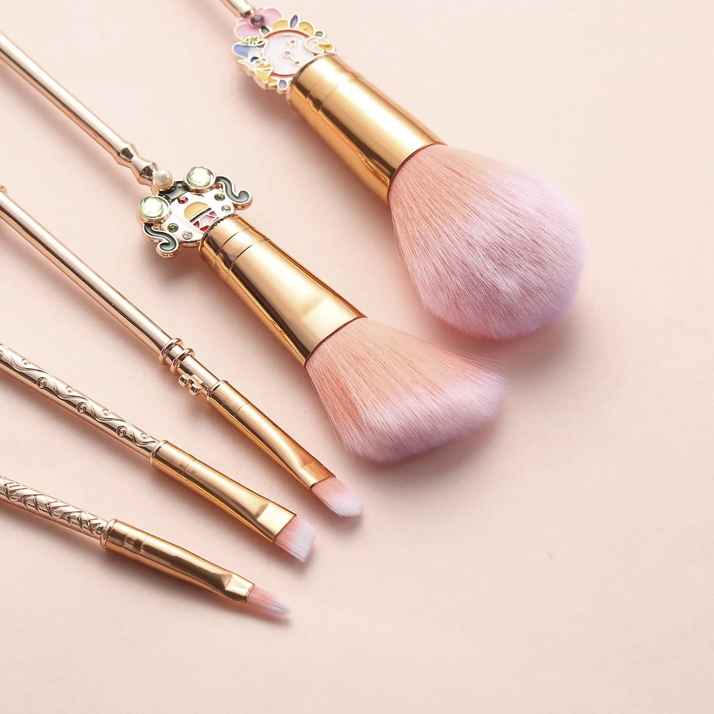 Alice makeup brush in rose gold and gold for precise makeup application
