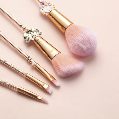 Alice makeup brush in rose gold and gold for precise makeup application