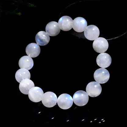 Natural blue moonlight round bead bracelet in white with polished moonstone beads showing blue sheen effect