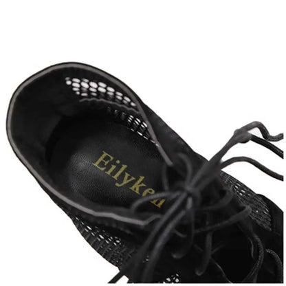 Black suede women's lace-up high heel shoes with an 11.5cm heel and 1cm platform.