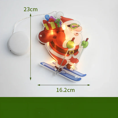 LED Christmas hanging lights with suction cups showing snowman design illuminated on window