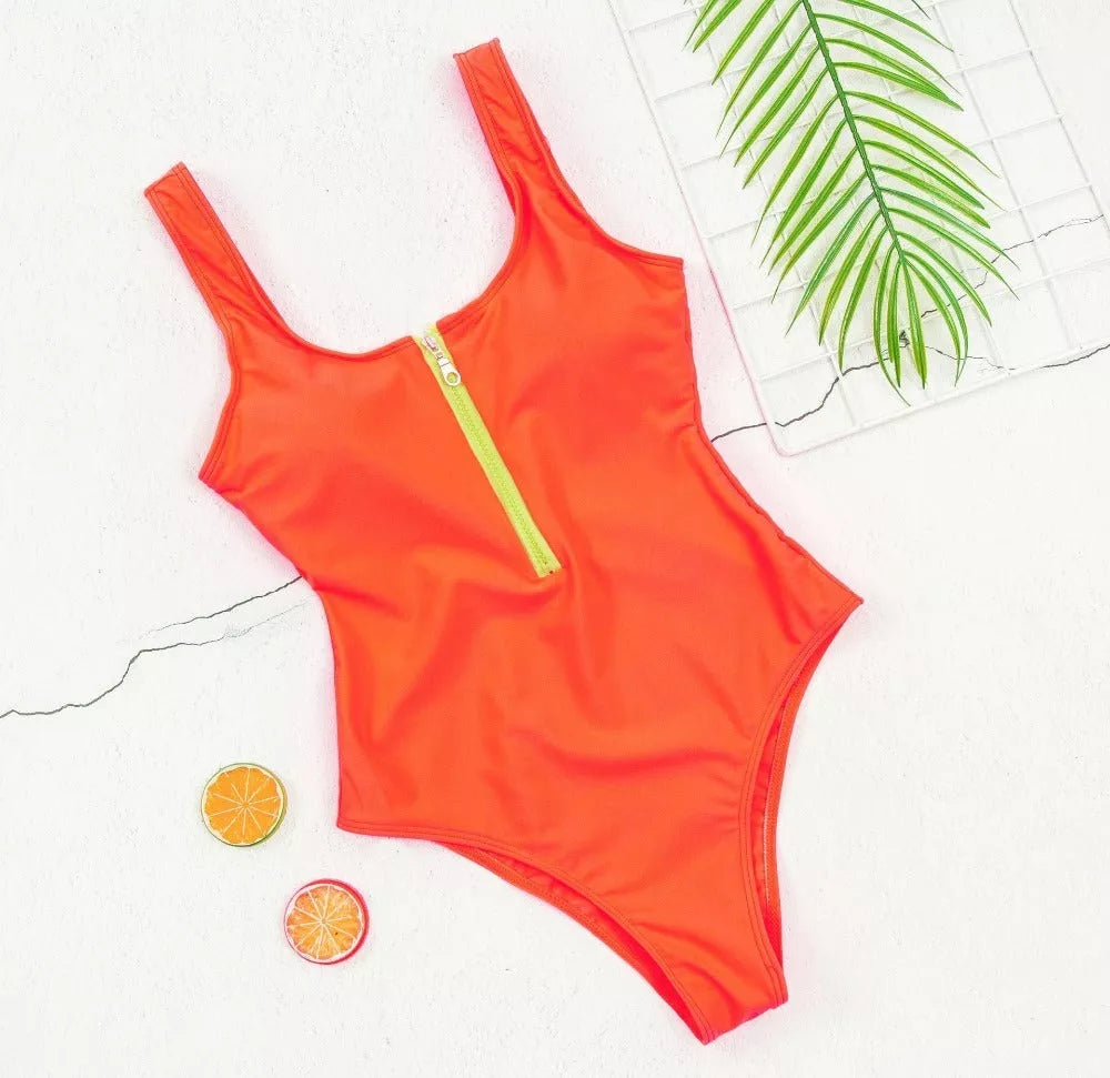 Ladies one-piece swimsuit with front zipper and printed design in various colors