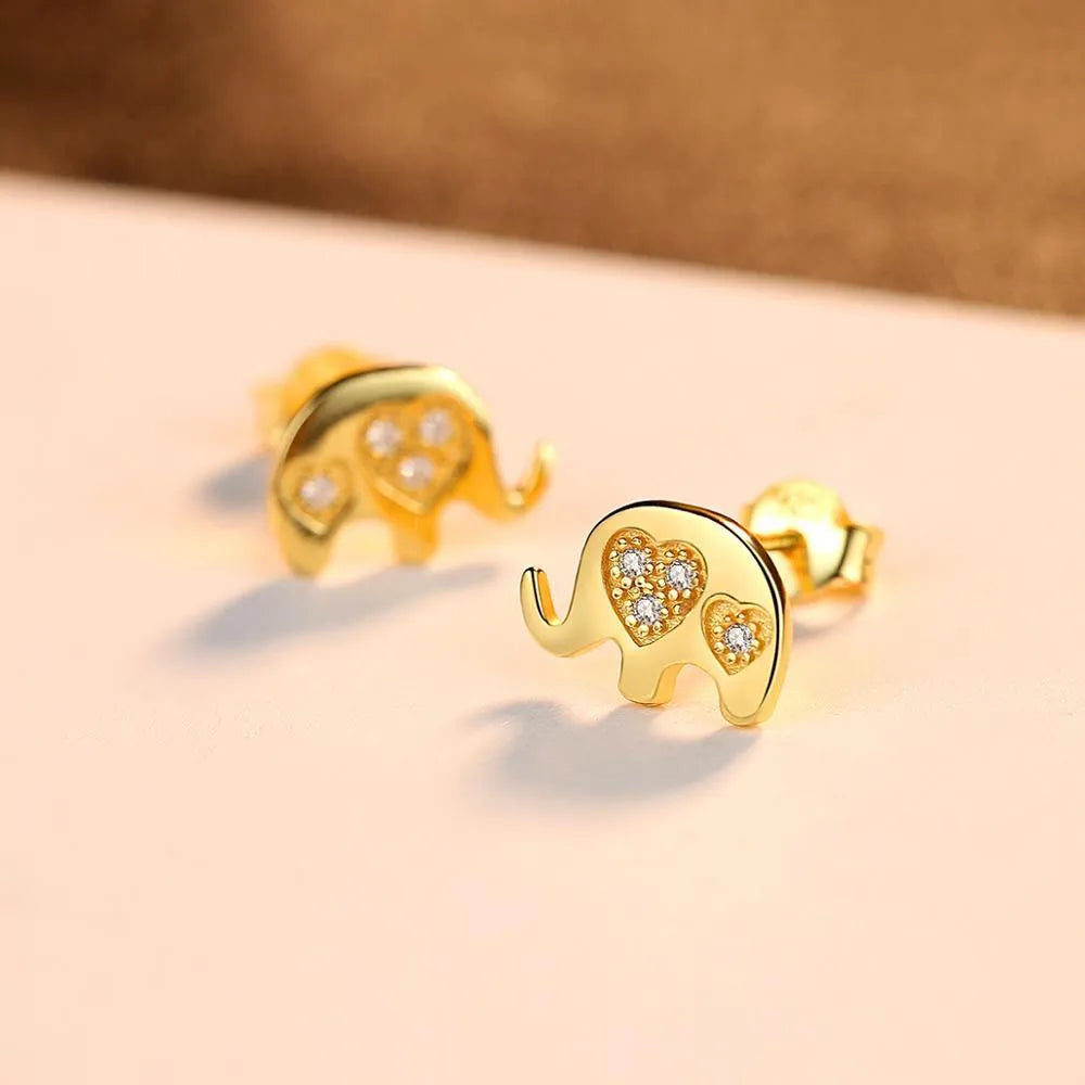 Small geometric silver earrings with gemstone setting in gold and silvery finishes