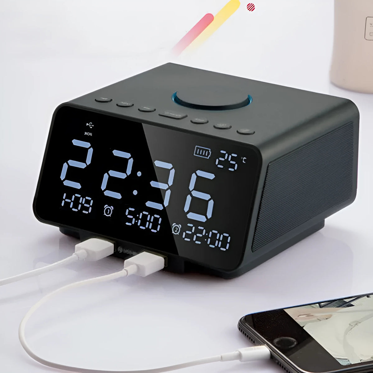 Black wireless alarm clock speaker with dual speakers, display, and control buttons