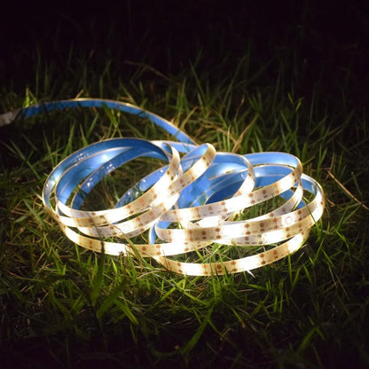Compact 70x70mm solar LED strip with 90 lights in warm white, IP65 rated for garden paths