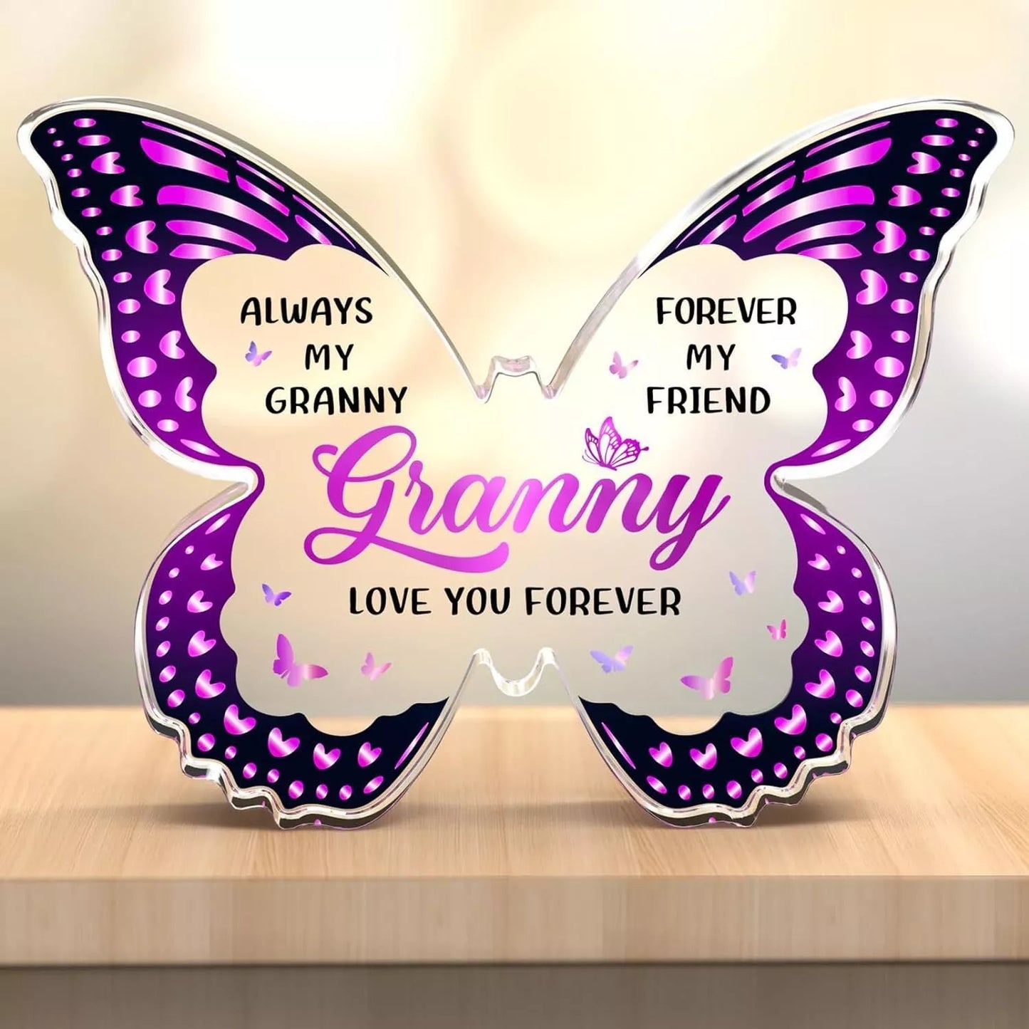 Butterfly-shaped acrylic keepsake with purple wing patterns and personalized message