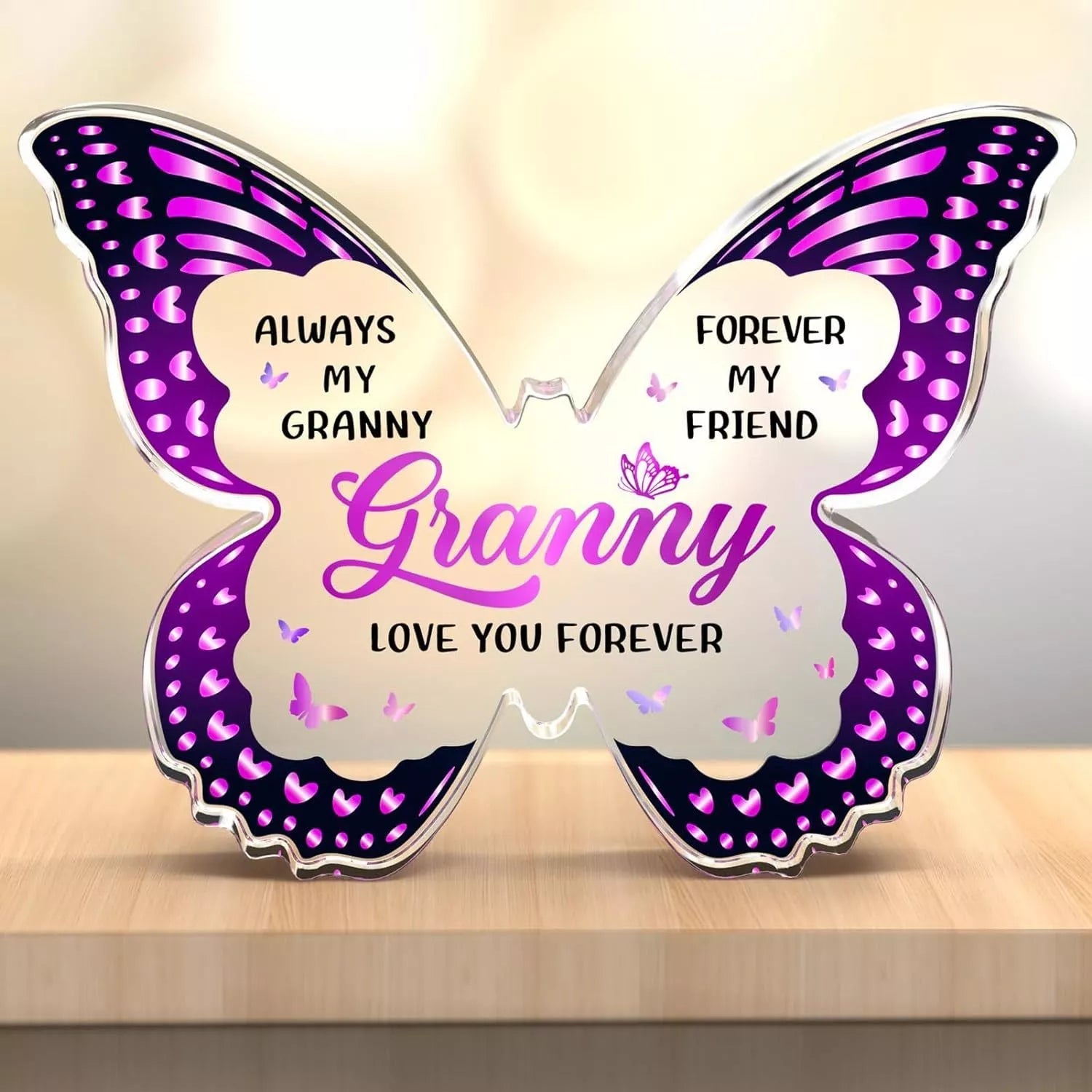 Butterfly-shaped acrylic keepsake with purple wing patterns and personalized message