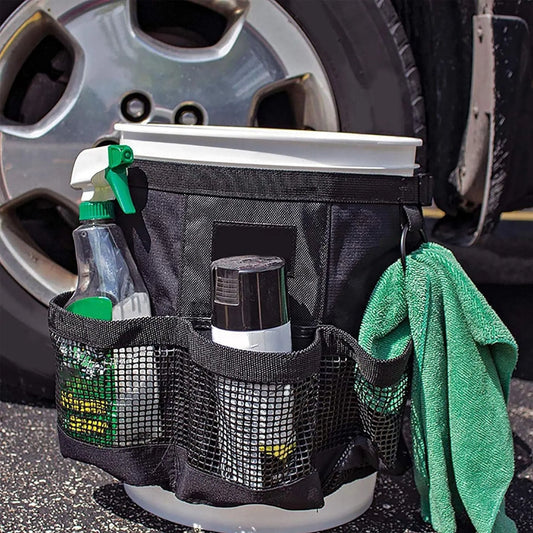 Black cylindrical hanging storage bag designed for 5-gallon barrels, made from polyester fabric