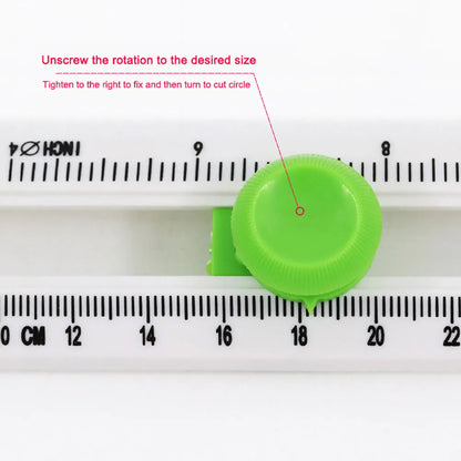 Green and orange plastic round paper cutter for office use, capable of cutting A3 sheets.