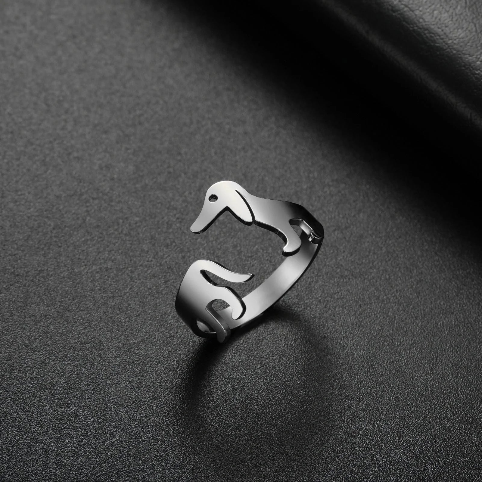 Adjustable Titanium Steel Sausage Dog Ring, a unique fashion accessory with a playful dog-inspired design made of premium materials