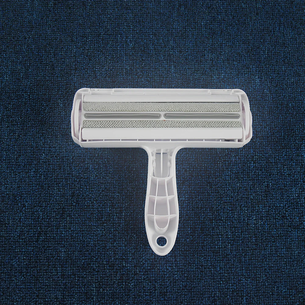 Blue pet hair removal comb with ABS plastic body and roller bristles for furniture cleaning