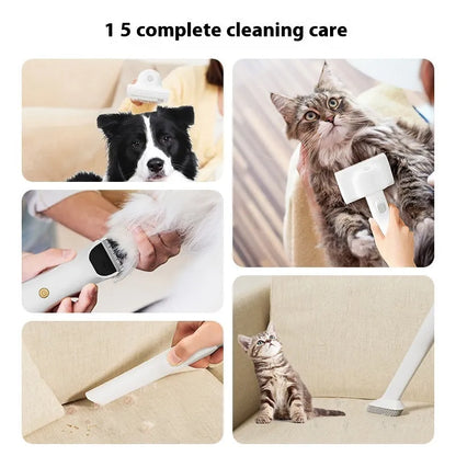 Pink and white pet grooming vacuum cleaner with shear attachment and accessories on a white background.