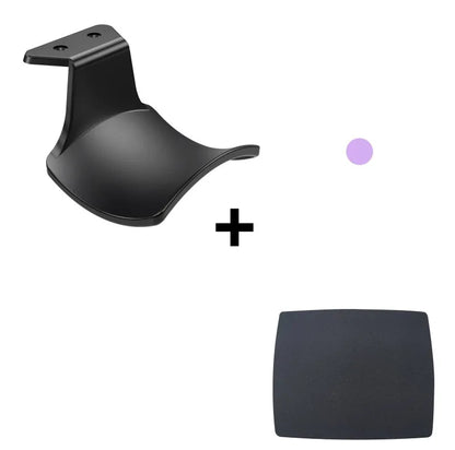 Black ABS plastic wall hanging rack with an X-shaped handle, shown with adhesive gel and screws for mounting.