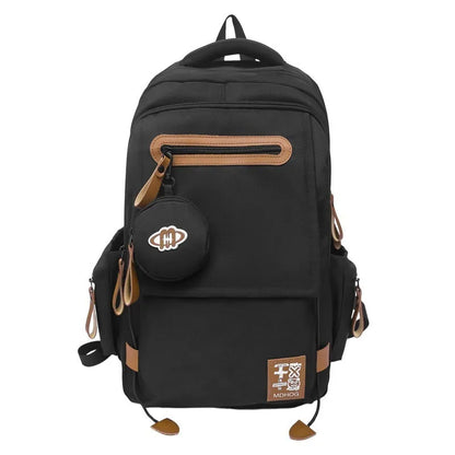 Large waterproof nylon travel backpack in blue with contrast stitching and 20-35 litre capacity