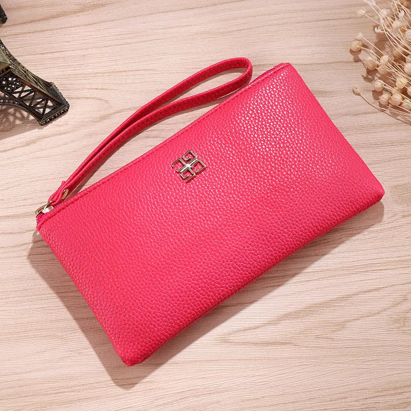 Long 55 cm PU leather wallet handbag in wine red colour with zipper closure open showing interior phone pocket and card slots