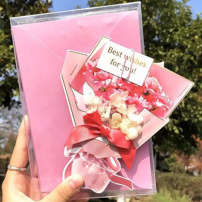 Handmade 3D pop-up greeting card with butterfly shape showing artificial flowers and hot stamping details