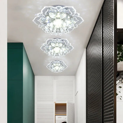 Modern minimalist crystal ceiling lamp with flower-shaped acrylic shade and stainless steel mount