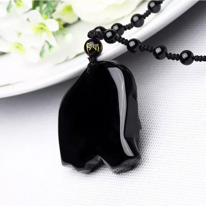 Hand-carved obsidian elephant pendant necklace with stretch bead chain for wealth and protection