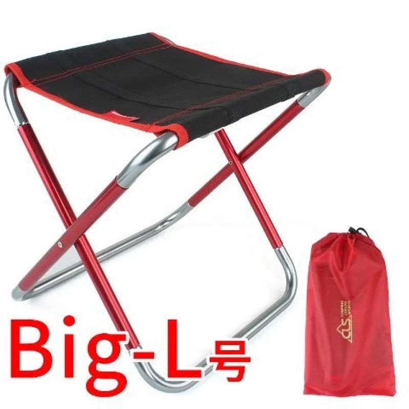 Compact outdoor folding chair in blue or red with aluminum frame and Oxford cloth seat