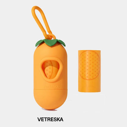Plastic dog poop bag dispenser capsule clipped to a lead next to a roll of scented waste bags.
