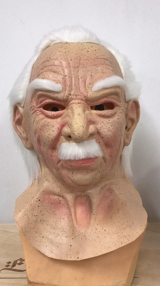 Latex old man Halloween mask with white hair and beard showing realistic facial wrinkles