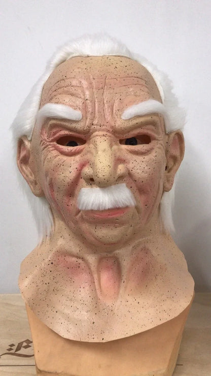 Latex old man Halloween mask with white hair and beard showing realistic facial wrinkles