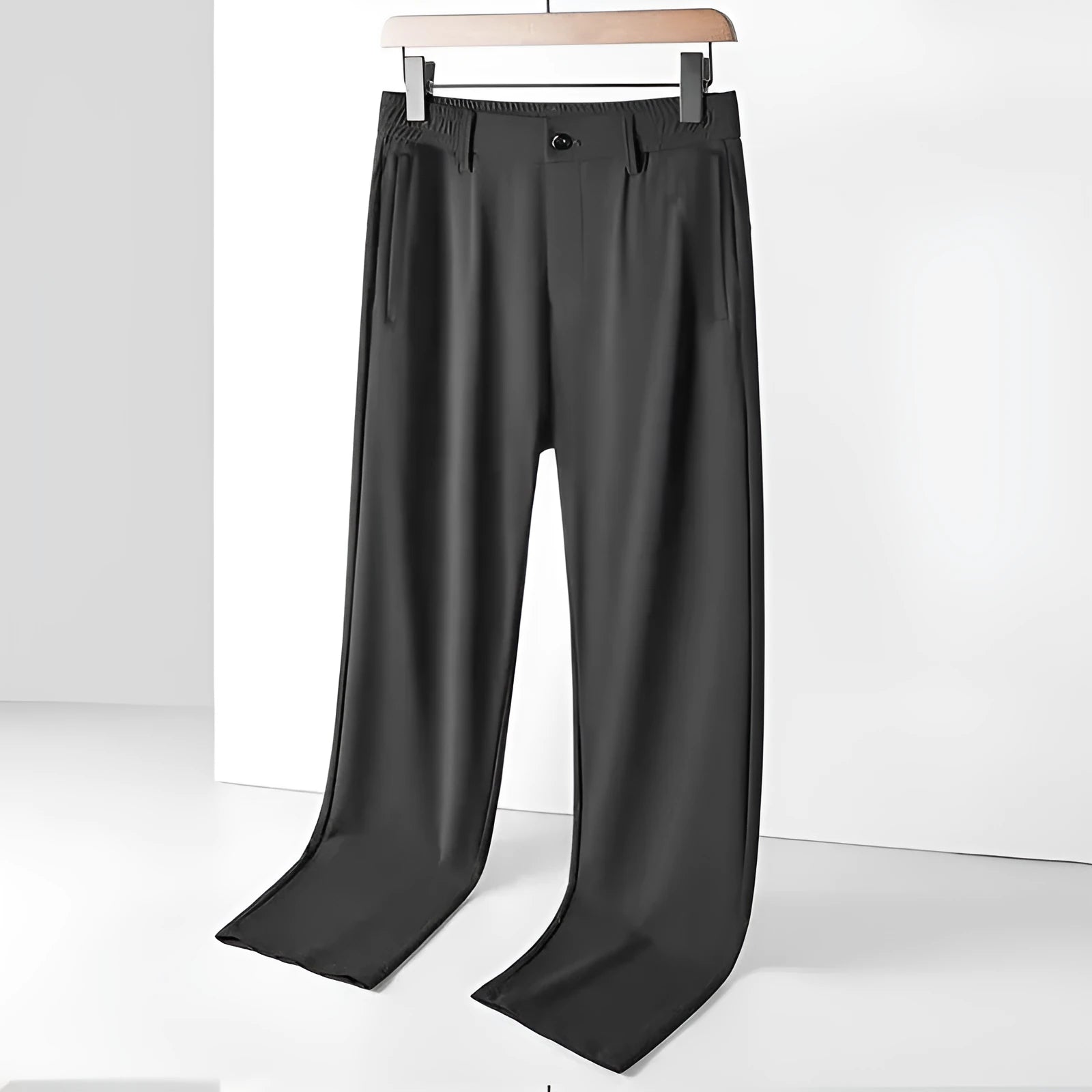 Men's black Ice Silk straight leg leisure trousers with elastic waistband laid flat