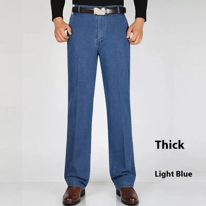 Men's high waist loose fit blue jeans on a hanger showing zip fly and casual style.