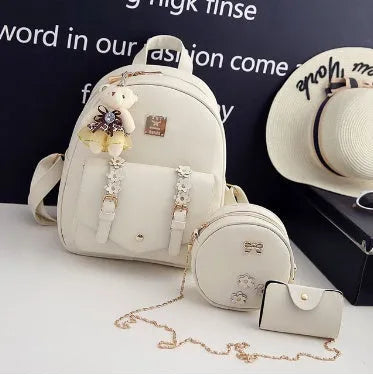 Women's PU leather 3-piece bag set showing backpack, shoulder bag, and card purse in a choice of colours.