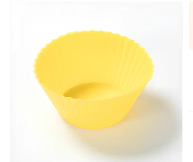 Six different coloured silicone cupcake liners showing fluted edges and nonstick surface