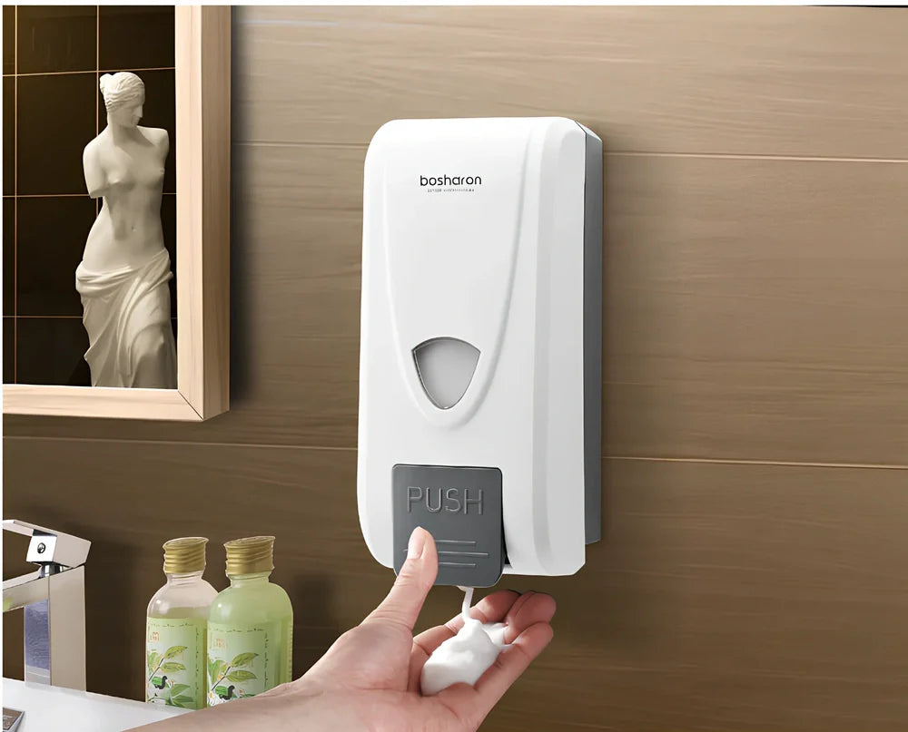White wall-mounted hand press foam soap dispenser with 1000ml capacity and compact design