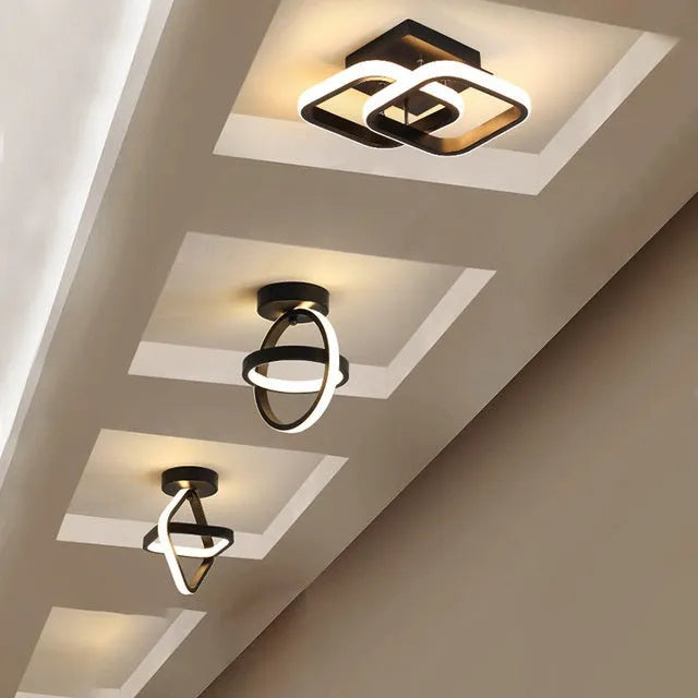 Modern round ceiling light with black metal frame and white acrylic shade, diameter 21cm.