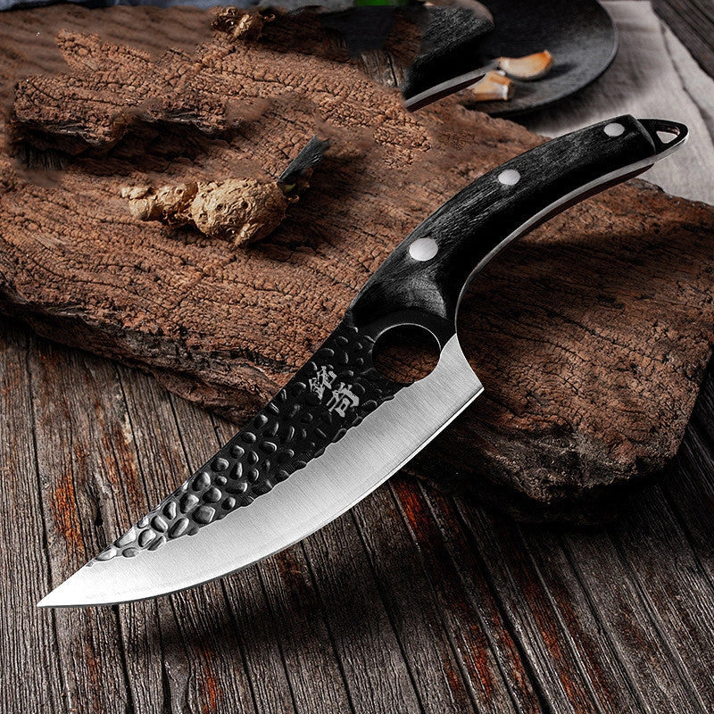 Handcrafted stainless steel boning knife with ergonomic handle for precision cooking tasks