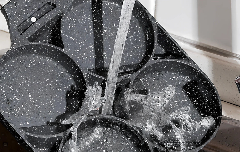 Four-hole non-stick fried egg pan, 24 cm diameter, aluminium with Whitford granite coating, 2 cm depth, silicone handle