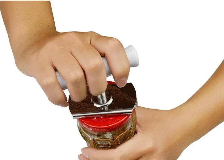 White stainless steel adjustable manual bottle opener with ABS handle on a plain background