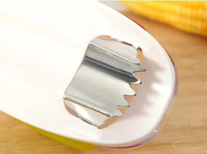Kitchen corn separator tool with stainless steel blade and plastic case for removing kernels from corncobs