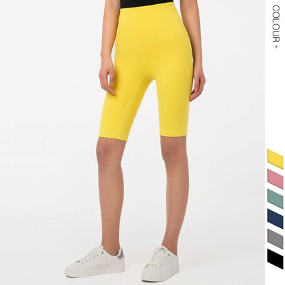 Women's yoga pants with five-point design in tidewater teal colour showing moisture-wicking nylon fabric