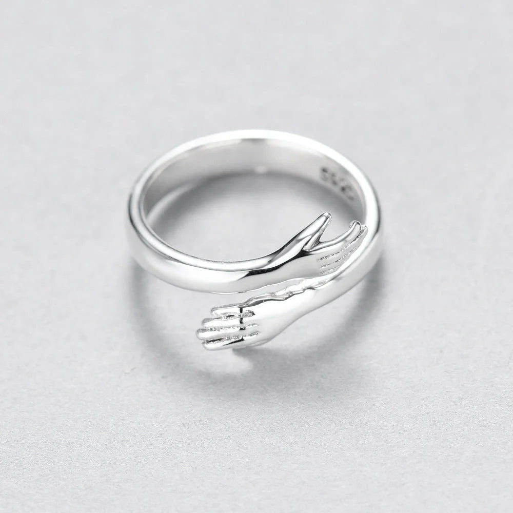 Sleek adjustable couple's ring made of premium brass and stainless steel, symbolizing the eternal embrace of love