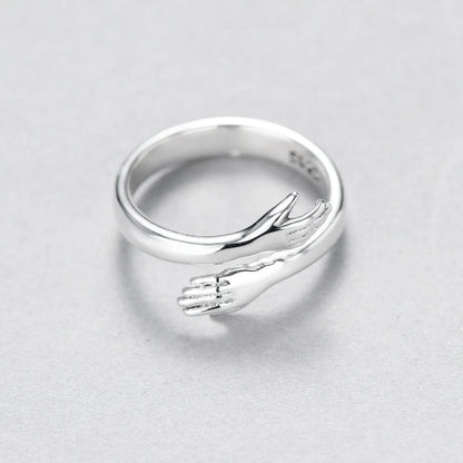 Sleek adjustable couple's ring made of premium brass and stainless steel, symbolizing the eternal embrace of love