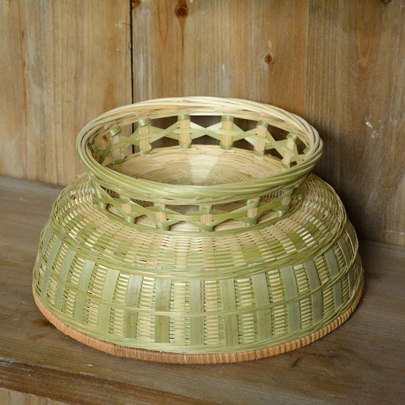 Handmade bamboo storage basket with woven design in 26x8cm, 25x9cm, and 24x12cm sizes on a wooden table