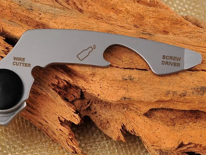 Stainless steel multi-function keychain with geometric gadgets including screwdrivers and hex wrenches