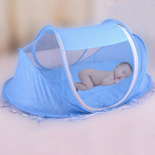 Portable foldable baby bed net with built-in mattress and pillows, perfect for travel and outdoor activities