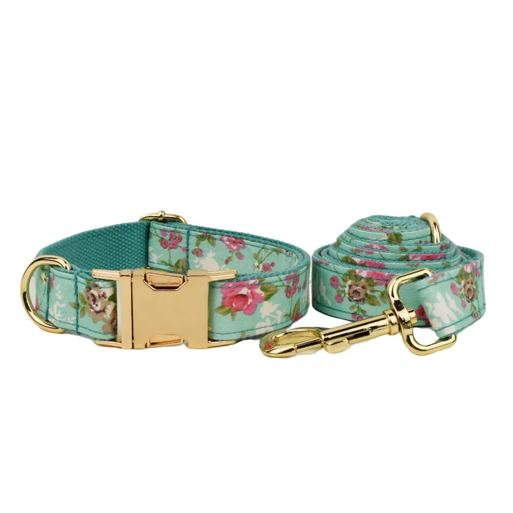 Fabric dog collar and leash set with detachable rose bow in green background
