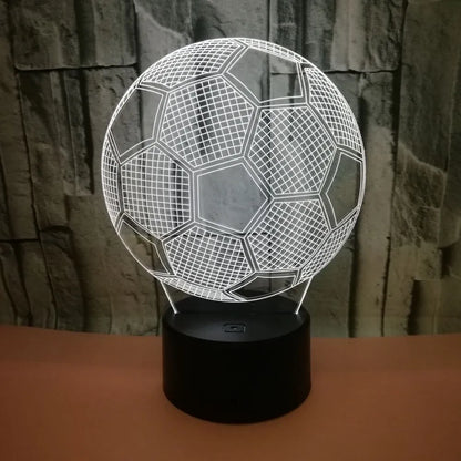 3D football-shaped LED night light showing colourful gradient illumination on a dark background
