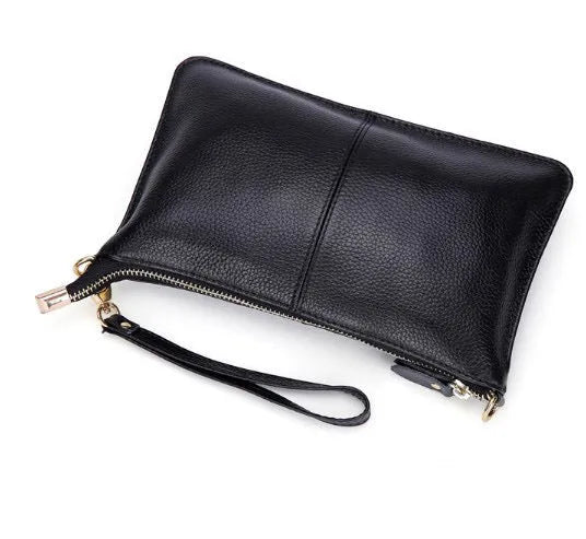 Lady's cowhide slant bag in apricot colour showing front view with strap and compact 24 cm size.