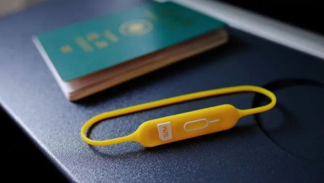 Green gray silicone card holder open showing magnetic closure and visible card slots