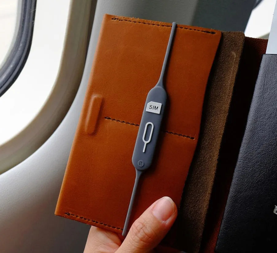 Green gray silicone card holder open showing magnetic closure and visible card slots
