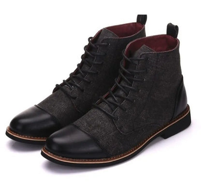 Men's leather boots with belt buckle details and rubber soles in black colour