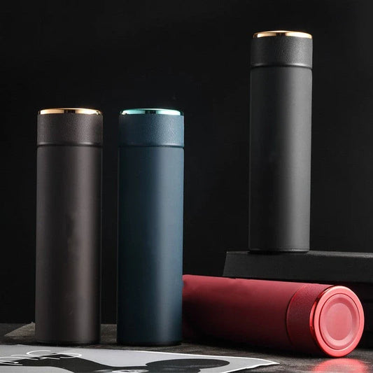 Ergonomic business travel mug with temperature display, made of durable stainless steel in black, red, and blue colors